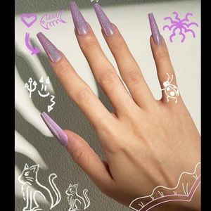 Touch and glow fake extra long nails in color purple glow brand new in box